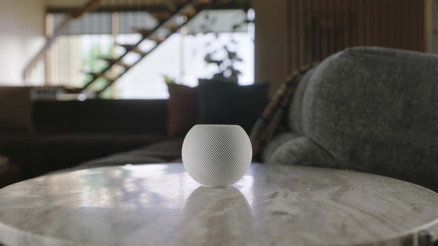 This image provided by Apple shows the new HomePod Mini that Apple unveiled Tuesday, Oct. 13, 2020. The new HomePod Mini will cost almost $100. It will integrate Apple's own music service, of course,  ...
