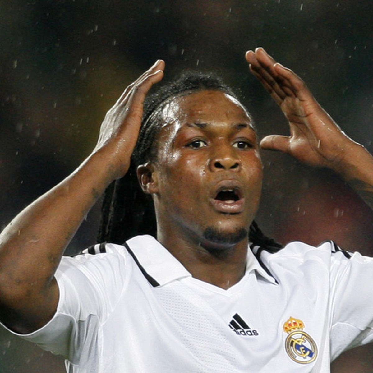 Real Madrid's Royston Drenthe from the Netherlands reacts during his Spanish La Liga soccer match against Barcelona at the Camp Nou stadium, Saturday, Dec. 13, 2008. (AP Photo/Daniel Ochoa de Olz ...