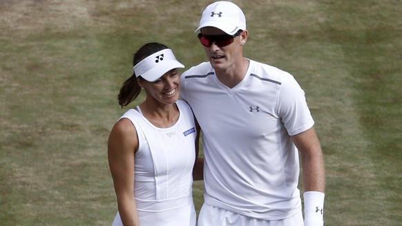 Martina Hingis of Switzerland and Jamie Murray of Great Britain after winning their mixed doubles match against Ken Skupski and Jocelyn Rae of Great Britain, during the Wimbledon Championships at the  ...