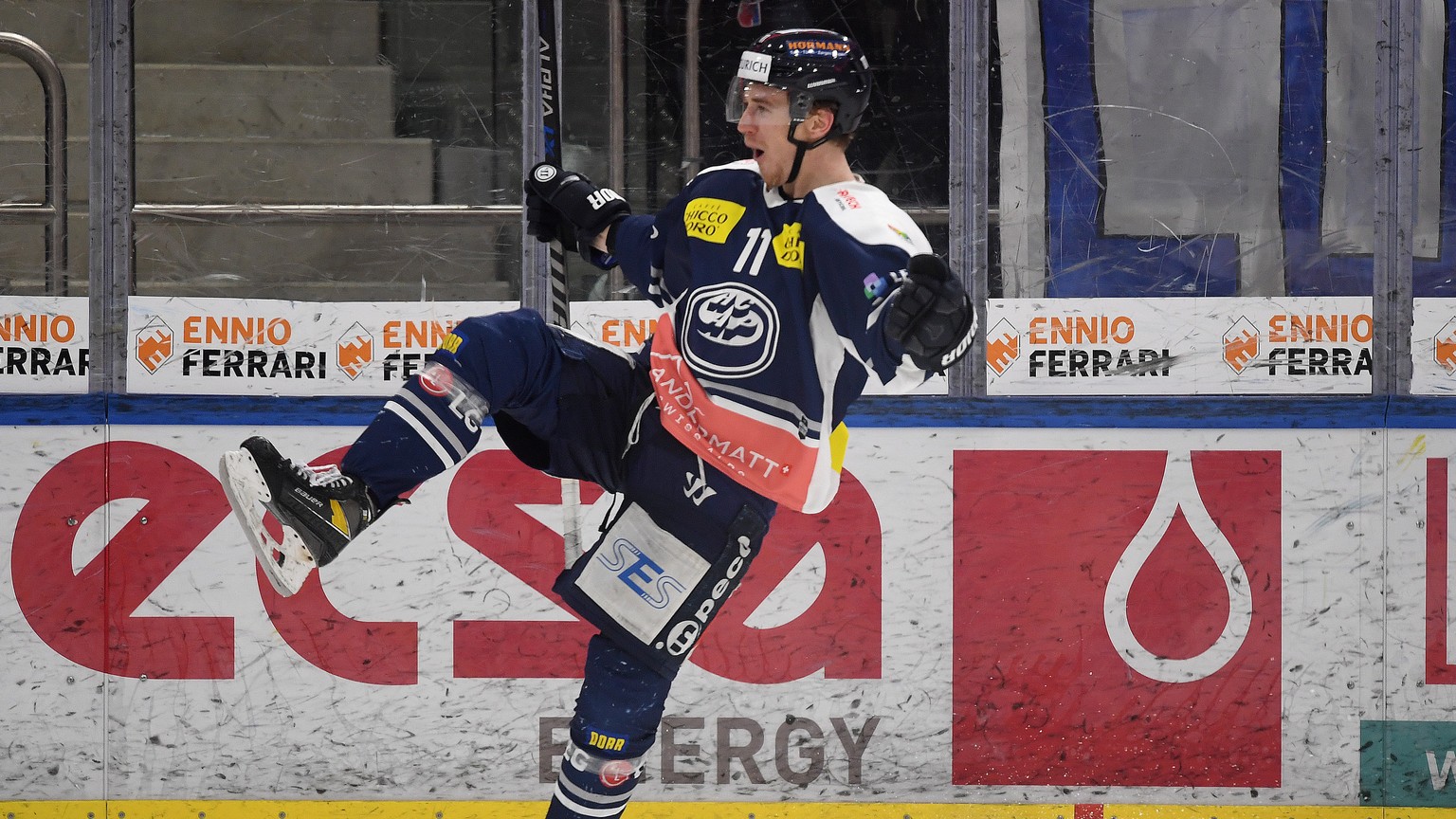 Ambri&#039;s player Johnny Kneubuehler celebrates the 4-0 goal during the preliminary round game of National League Swiss Championship between HC Ambri-Piotta and SC Rapperswil-Jona Lakers at the Gott ...