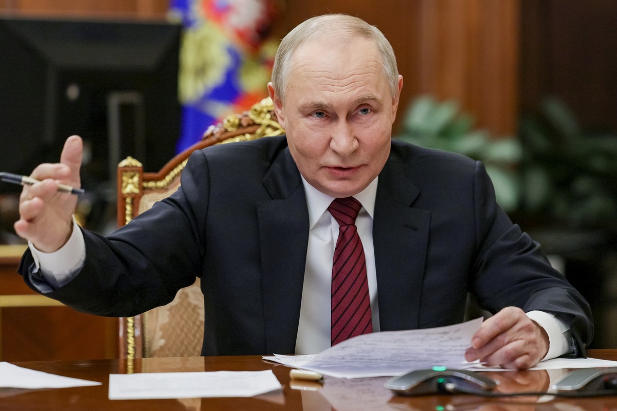 Russian President Vladimir Putin gestures during a call with military leaders on the Ukraine battlefield situation at the Kremlin in Moscow, on Thursday, Dec. 11, 2025. (Gavriil Grigorov, Sputnik, Kre ...