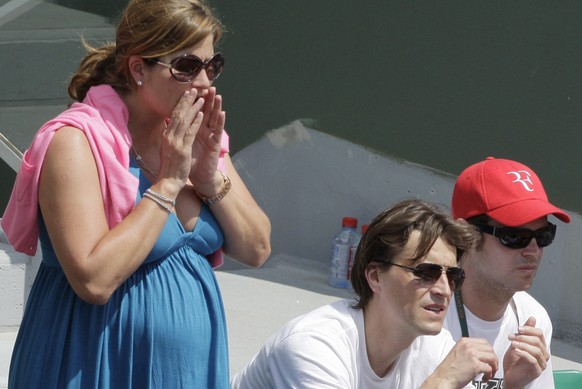 Mirka Vavrinec, the wife of Switzerland's Roger Federer, yells as she watches her husband play his fourth round match against Germany's Tommy Haas at the French Open tennis tournament at the Roland Ga ...