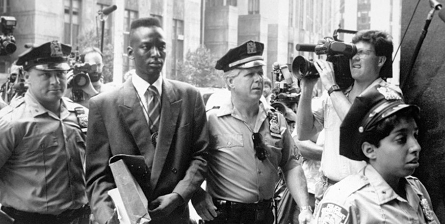 FILE - This 1990 file photo provided by Sundance Selects shows accused rapist Yusef Salaam, second right, being escorted by police in New York in 1990. Salaam is the subject of the documentary, &quot; ...