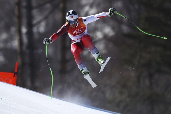 Switzerland&#039;s JustinÂ Murisier skis during the downhill portion of the men&#039;s combined at the 2018 Winter Olympics in Jeongseon, South Korea, Tuesday, Feb. 13, 2018. (AP Photo/Alessandro Trov ...