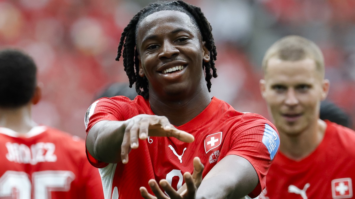Switzerland's Johan Manzambi celebrates after scoring the second goal during the World Cup Group B soccer match between Switzerland and Canada at the BC Place stadium in Vancouver, Canada, Wednes ...