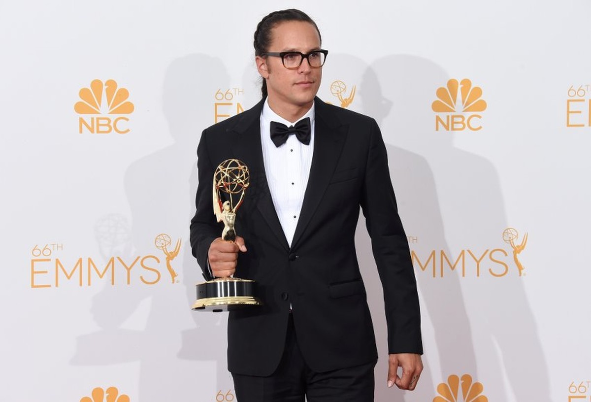 LOS ANGELES, CA - AUGUST 25: Director Cary Joji Fukunaga, winner of the Outstanding Directing for a Drama Series Award for True Detective (Episode: "Who Goes There"), poses in the press room ...