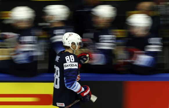 Patrick Kane, center, of the United States celebrates with teammates after scoring a goal during the Ice Hockey World Championships group B match between united States and South Korea at the Jyske Ban ...