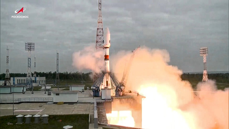 In this photo taken from video and released by Roscosmos State Space Corporation, the Soyuz-2.1b rocket with the moon lander Luna-25 automatic station takes off from a launch pad at the Vostochny Cosm ...