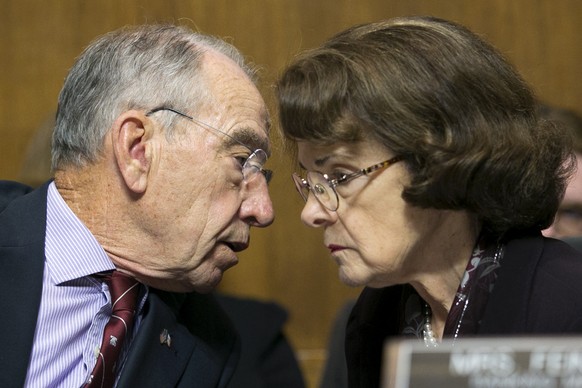 epa07055163 Republican Senator from Iowa and Chairman of the Senate Judiciary Committee Chuck Grassley (L) speaks with Democratic Senator from California and ranking member Dianne Feinstein (R) shortl ...