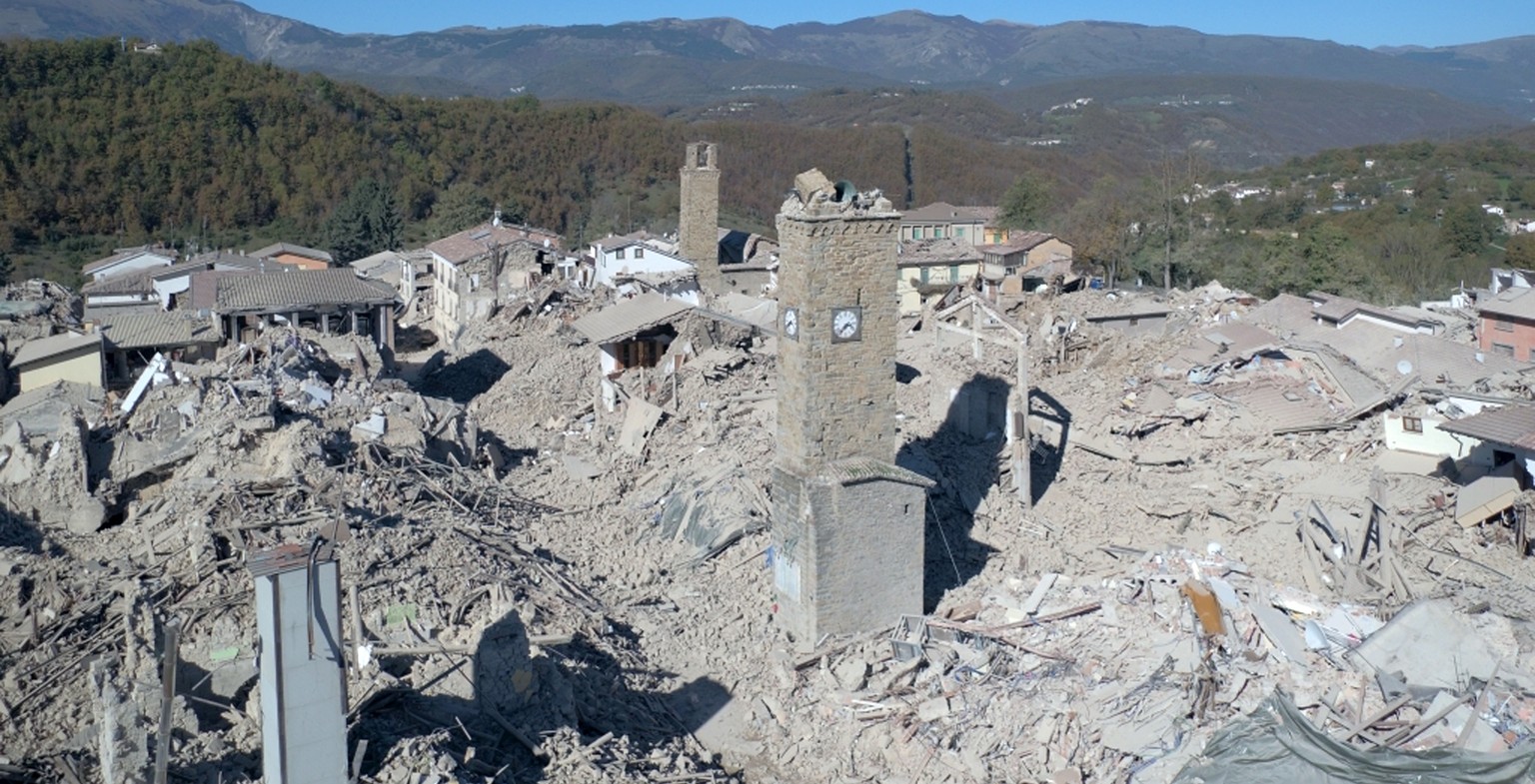 An aerial view of the destroyed hilltop town of Amatrice as an earthquake with a preliminary magnitude of 6.6 struck central Italy, Sunday, Oct. 30, 2016. A powerful earthquake rocked the same area of ...
