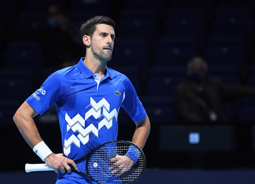 epa08831339 Novak Djokovic of Serbia in action against Alexander Zverev of Germany during their group stage match at the ATP Finals tennis tournament in London, Britain, 20 November 2020. EPA/ANDY RAI ...