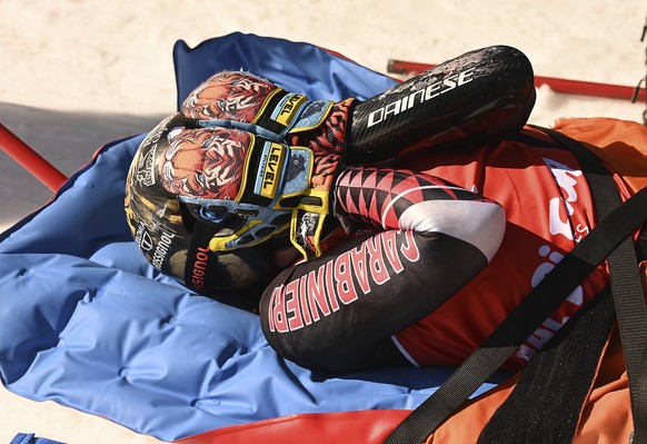 KEYPIX - Italy&#039;s Federica Brignone is carried away on a toboga after she broke multiple bones in her left leg during a giant slalom crash at the Italian championships in the Lusia ski area, in Va ...