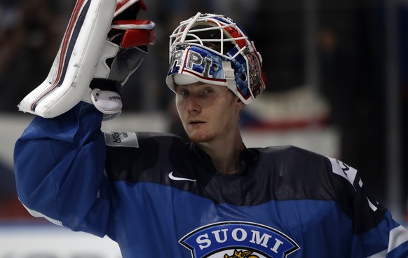 Finland&#039;s Joonas Korpisalo adjusts his helmet during the Ice Hockey World Championships group B match between Finland and Czech Republic in the AccorHotels Arena in Paris, France, Monday, May 8,  ...