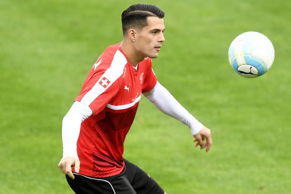 epa05571034 Swiss national soccer team player Granit Xhaka performs during his team&#039;s training session in Freienbach, Switzerland, 05 October 2016. Switzerland will face Hungary in the FIFA World ...