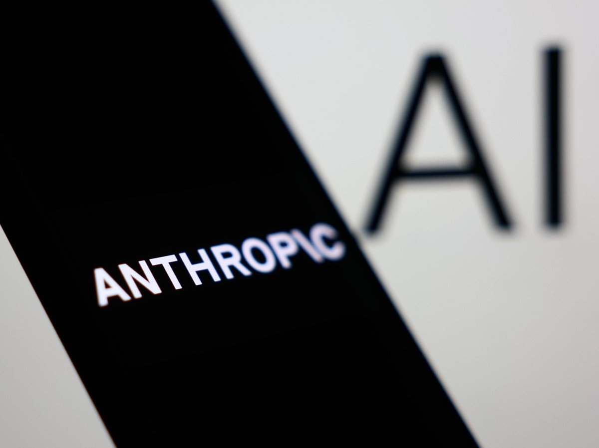 Anthropic AI Photo Illustrations Anthropic logo displayed on a phone screen and AI sign displayed on a screen are seen in this illustration photo taken in Krakow, Poland on December 26, 2025. Krakow P ...