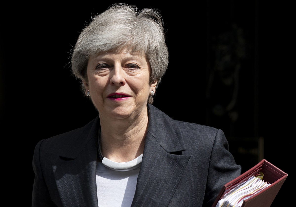 epa07591552 British Prime Minister Theresa May leaves 10 Downing Street to attend Prime Minister's Questions (PMQs) in the central London, Britain, 22 May 2019. Theresa May in a speech on 22 May  ...