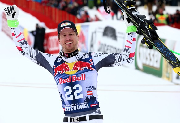 ARCHIV Â ZUR SKI ALPIN WELTCUP-ABFAHRT IN KITZBUEHEL, OESTERREICH, STELLEN WIR IHNEN FOLGENDES BILDMATERIAL DER LETZTEN 10 SIEGER ZUR VERFUEGUNG - First placed Austria&#039;s Hannes Reichelt celebrat ...