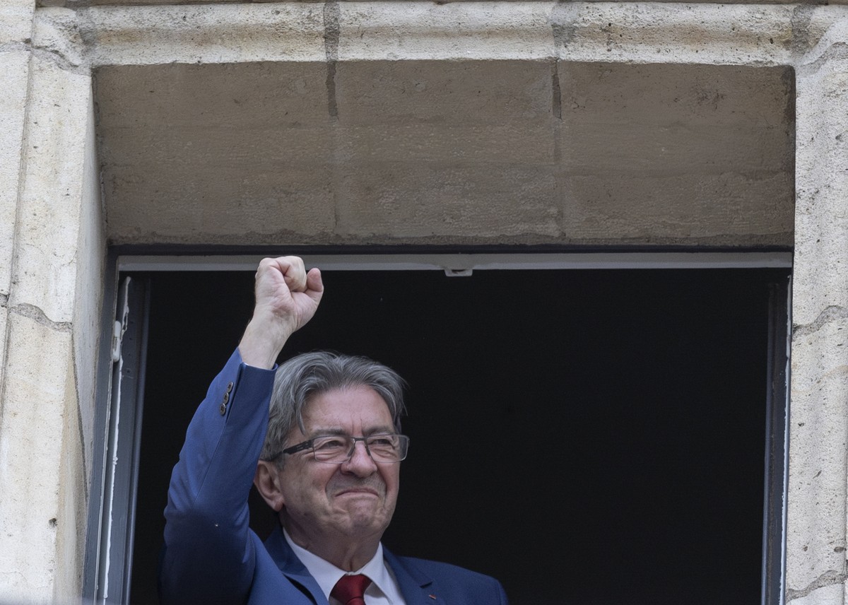 epa11465934 Jean-Luc Melenchon leader of La France Insoumise (LFI) reacts after the announcement of the results of the second round of the legislative elections in Paris, France, 07 July 2024. France  ...