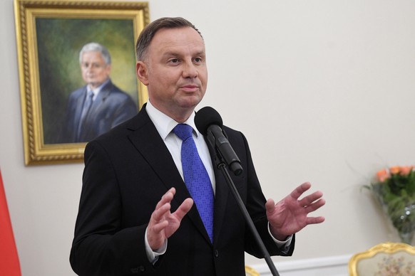 epa08542656 Incumbent President Andrzej Duda speaks for the media at the Presidential Palace in Warsaw, Poland, 12 July 2020. According to initiall exit polls, Polish President Andrzej Duda has won pe ...