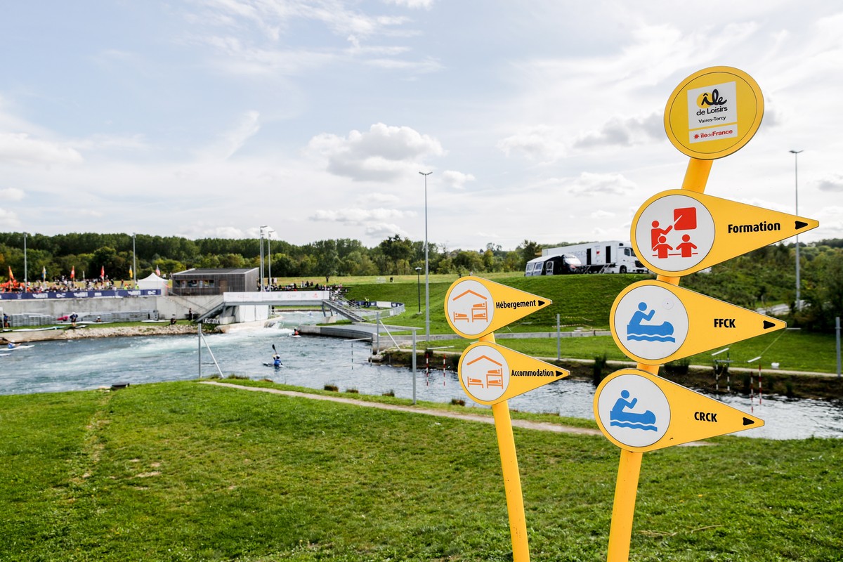 epa10901582 Signs at the nautical stadium during the Canoe Slalom World Cup in Vaires sur Marne, suburbs of Paris, France, 05 October 2023. The Canoe Slalom World Cup takes place from October 05 to 08 ...