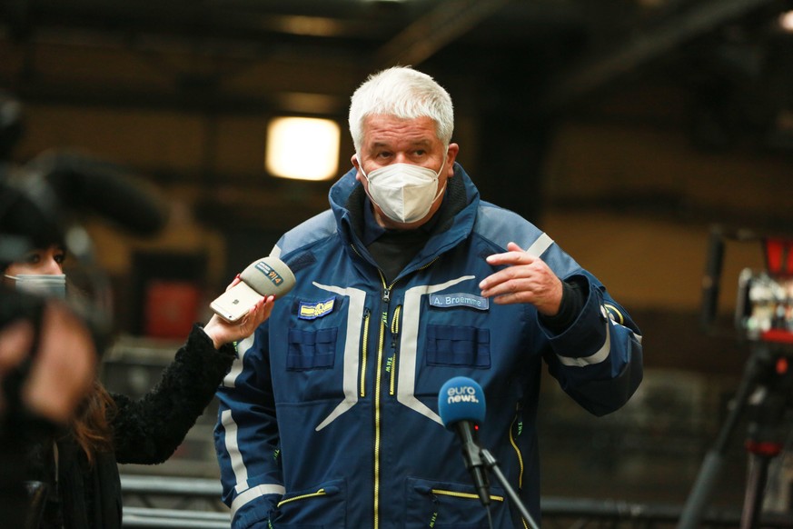 epa08859129 Albrecht Broemme of the THW (Federal Agency for Technical Relief) during a visit to facilities of a new COVID-19 vaccination center in Berlin Treptow, Germany, 03 December 2020. Some 80 mo ...