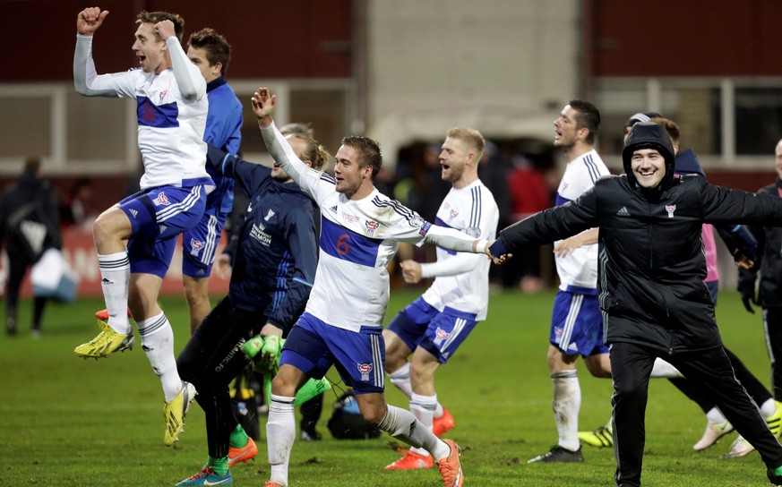 Football Soccer - Latvia v Faroe Islands - World Cup 2018 qualifiers - Skonto stadium, Riga, Latvia - 7/10/16. Players of Faroe Islands celebrate victory. REUTERS/Ints Kalnins