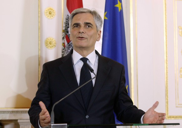 FILE - In this Nov. 26, 2015 file phot Austrian Chancellor Werner Faymann addresses the media during a news conference after talks with British Prime Minister David Cameron at the federal chancellery  ...