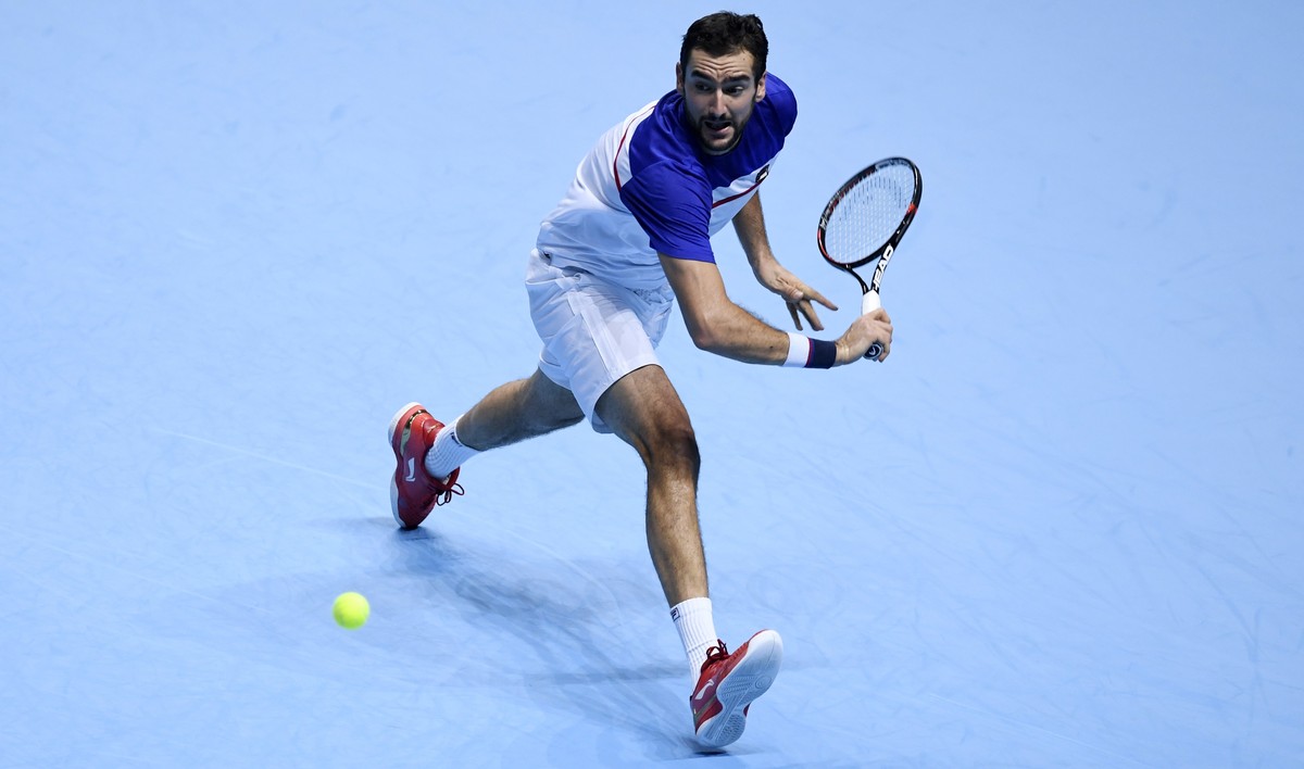 epa06328692 Marin Cilic of Croatia in action during his men's singles match against Jack Sock of the USA at the ATP World Tour Finals tennis tournament in London, Britain, 14 November 2017. EPA/W ...
