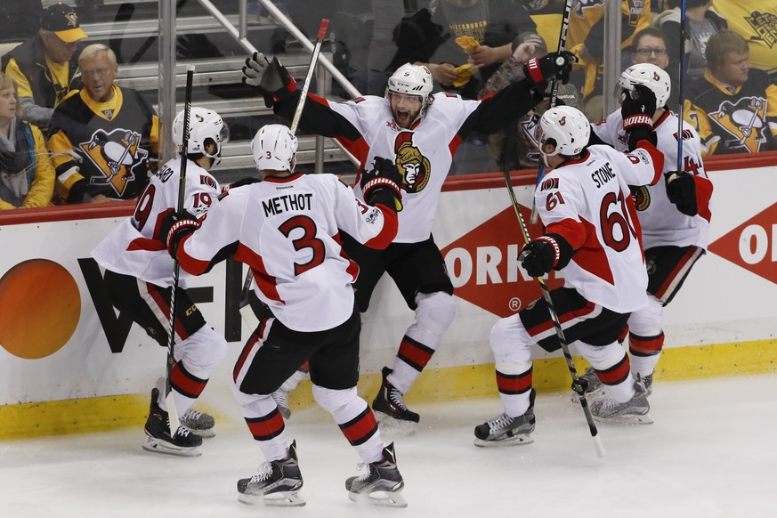 Ottawa Senators&#039; Bobby Ryan, center, celebrates with teammates Marc Methot (3), Derick Brassard (19), Mark Stone (61) and Jean-Gabriel Pageau (44) after scoring the game-winning goal against the  ...