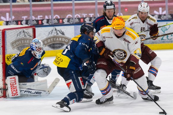 From left goalkeeper Gilles Senn (HCAP), Philippe Maillet (HCAP), Teemu Hartikainen (GSHC), during the regular season of National League Swiss Championship 2024/25 between HC Ambri Piotta and Geneva-S ...