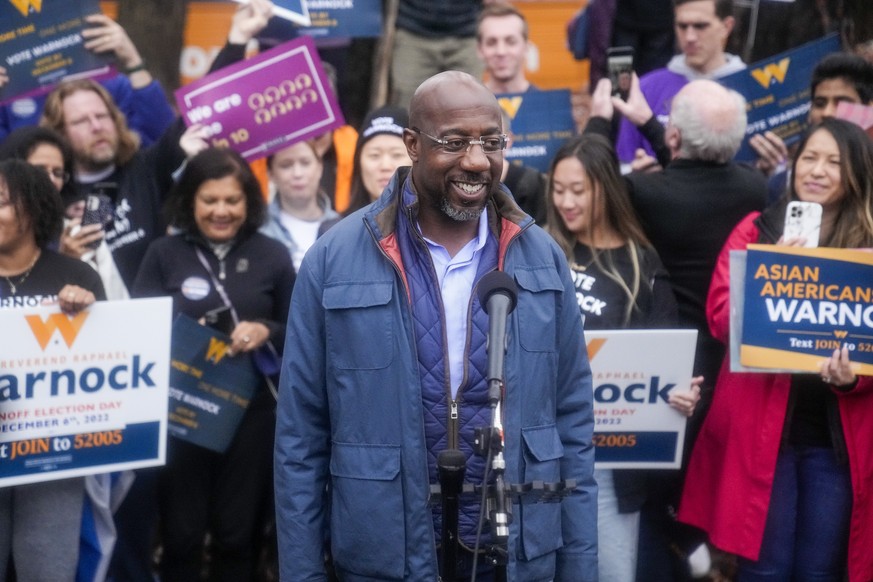 Democratic Sen. Raphael Warnock speaks during an election day canvass launch on Tuesday, Dec. 6, 2022, in Norcross, Ga. Sen. Warnock is running against Republican candidate Herschel Walker in a runoff ...