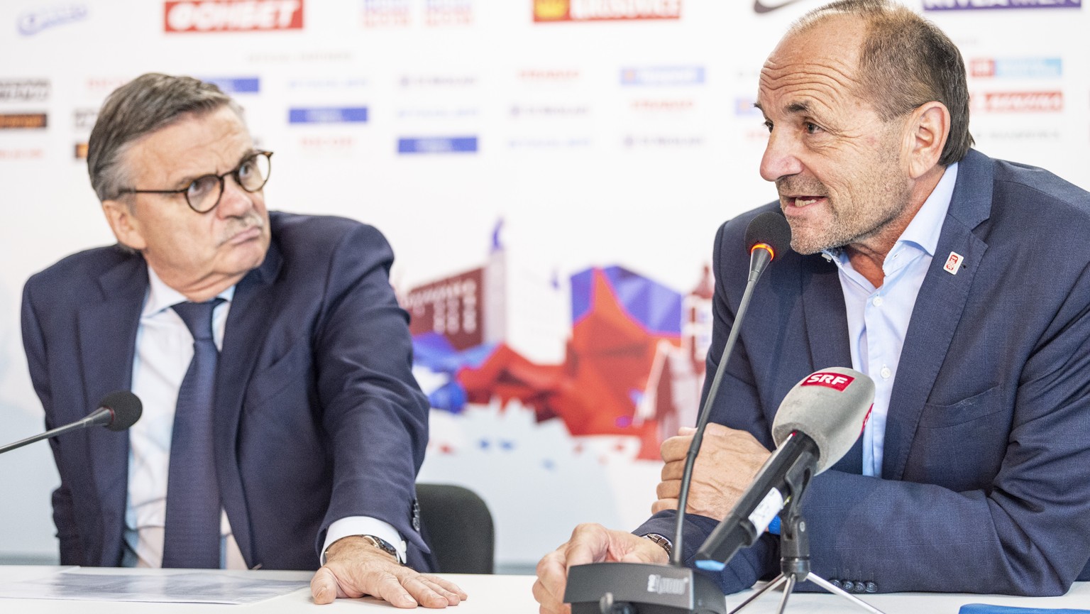 IIHF President Rene Fasel and Gian Gilli, General Secretary IIFH 2020, from left, during the press conference at the IIHF 2019 World Ice Hockey Championships, at the Ondrej Nepela Arena in Bratislava, ...