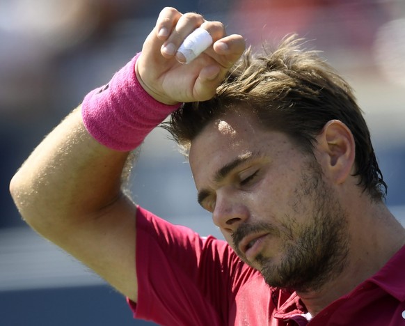 Stanislas Wawrinka, of Switzerland, reacts after failing to win his first set against Kei Nishikori, of Japan, during men&#039;s semifinal Rogers Cup tennis action, in Toronto on Saturday, July 30, 20 ...