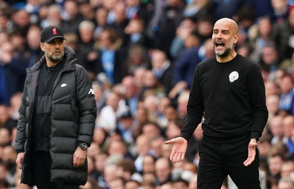 Premier League Fixtures Announced File photo dated 10-04-2022 of Manchester City manager Pep Guardiola (right) and Liverpool manager Jurgen Klopp. Liverpool and City renew their rivalry at Anfield on  ...