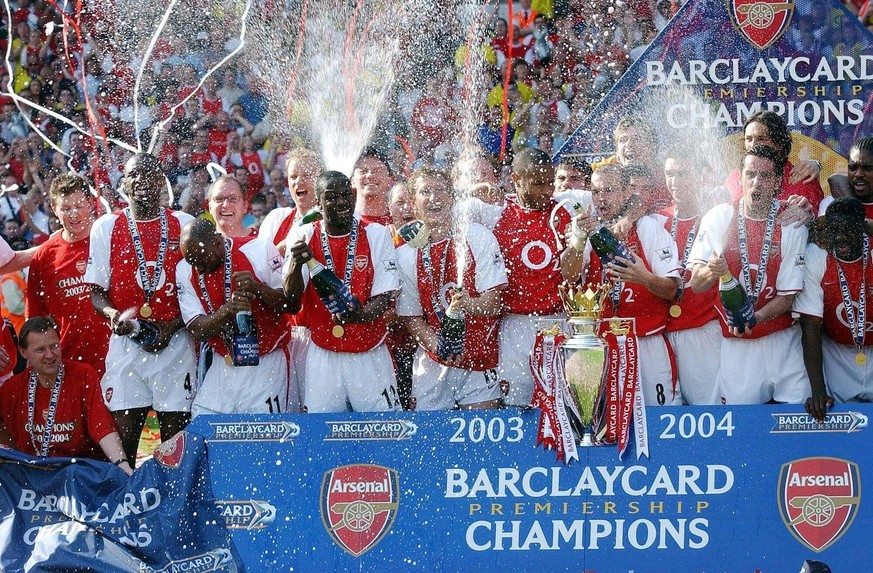 30 Years of The Premier League Package File photo dated 15-05-2004 of Arsenal players celebrating victory in the Premier League. Only the Arsenal Invincibles have completed a season unbeaten with Arse ...