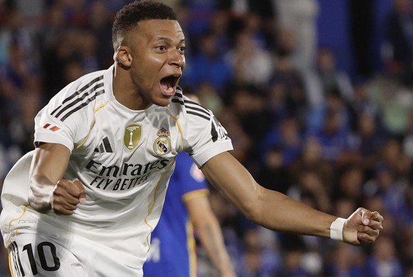 epa12465818 Real Madrid&#039;s Kylian Mbappe celebrates scoring the 0-1 goal during the Spanish LaLiga soccer match between Getafe CF and Real Madrid in Getafe, Spain, 19 October 2025. EPA/SERGIO PERE ...