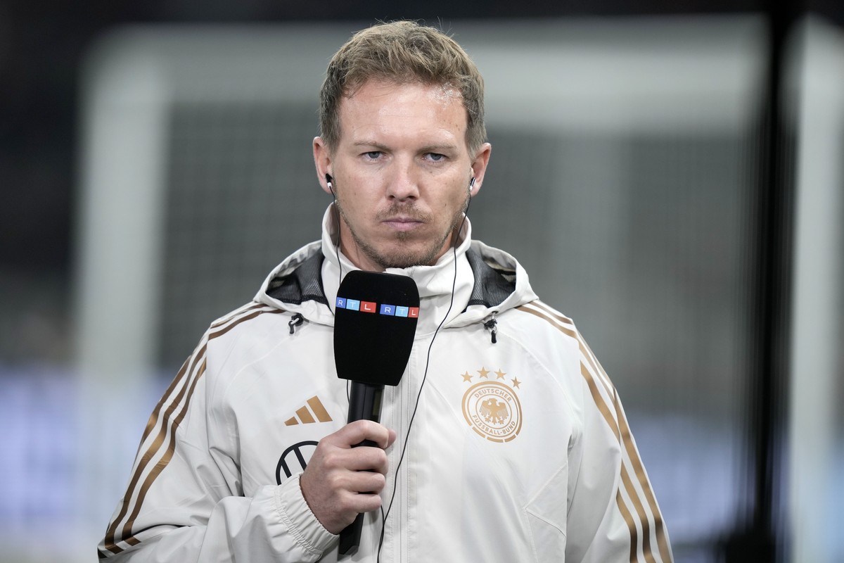Germany's head coach Julian Nagelsmann gives an interview prior an international friendly soccer match between Germany and Turkey in Berlin, Germany, Saturday, Nov. 18, 2023. (AP Photo/Markus Sch ...