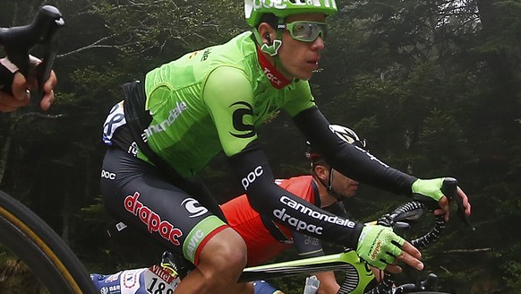 Colombia&#039;s Rigoberto Uran, center, speeds downhill during the twelfth stage of the Tour de France cycling race over 214.5 kilometers (133.3 miles) with start in Pau and finish in Peyragudes, Fran ...