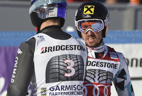 Austria&#039;s Marcel Hirscher, right, is congratulated by France&#039;s Alexis Pinturault after winning an alpine ski, men&#039;s World Cup giant slalom, in Garmisch-Partenkirchen, Germany, Sunday, J ...