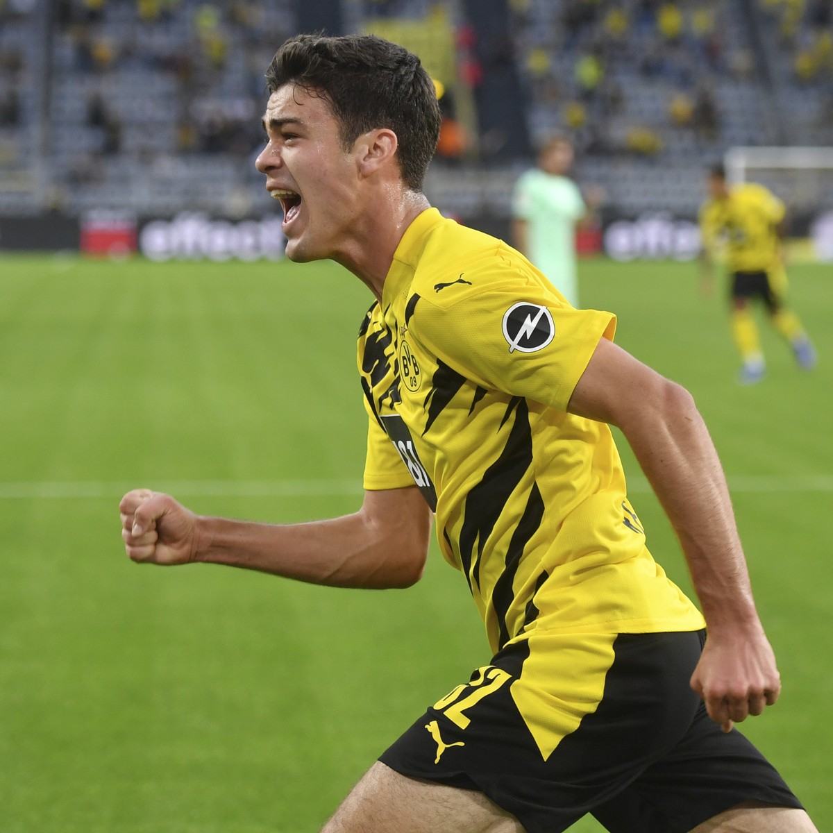 Dortmund's Giovanni Reyna celebrates scoring during the Bundesliga soccer match between Borussia Dortmund and Borussia Monchengladbach at Signal Iduna Park, Dortmund, Germany, Saturday Sept. 19,  ...