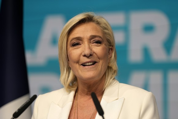 French far-right leader Marine Le Pen delivers her speech at the party election night headquarters after French President Emanuel Macron announced he dissolves National Assembly and calls new legislat ...