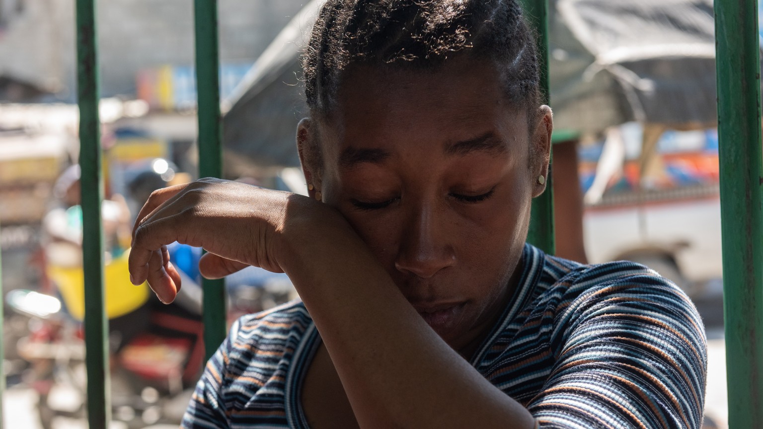 epa09939009 Madame Jesula Ville, seven months pregnant, recounts the murder of her husband, whose body was burned by armed gangs, during an interview with Efe, in Port-au-Prince, Haiti, 10 May 2022. T ...
