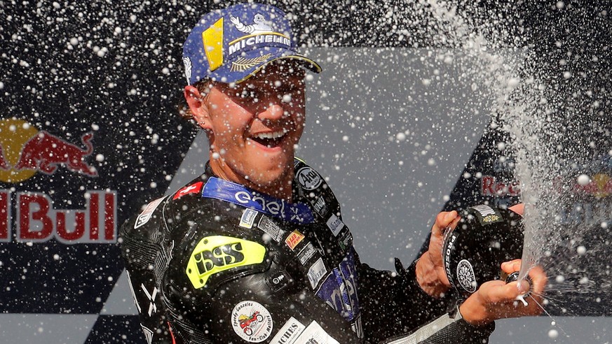 epa08566627 Swiss MotoE rider Dominique Aegerter of Dynavolt Inteact GP, celebrates after winning the MotoE race in Jerez-Angel Nieto circuit in Jerez de la Frontera, Spain, 26 July 2020, during the M ...