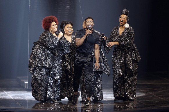 epa07582597 Contestant John Lundvik (C) of Sweden performs &#039;Too Late For Love&#039; during the Grand Final of the 64th annual Eurovision Song Contest (ESC) at the Expo Tel Aviv, in Tel Aviv, Isra ...