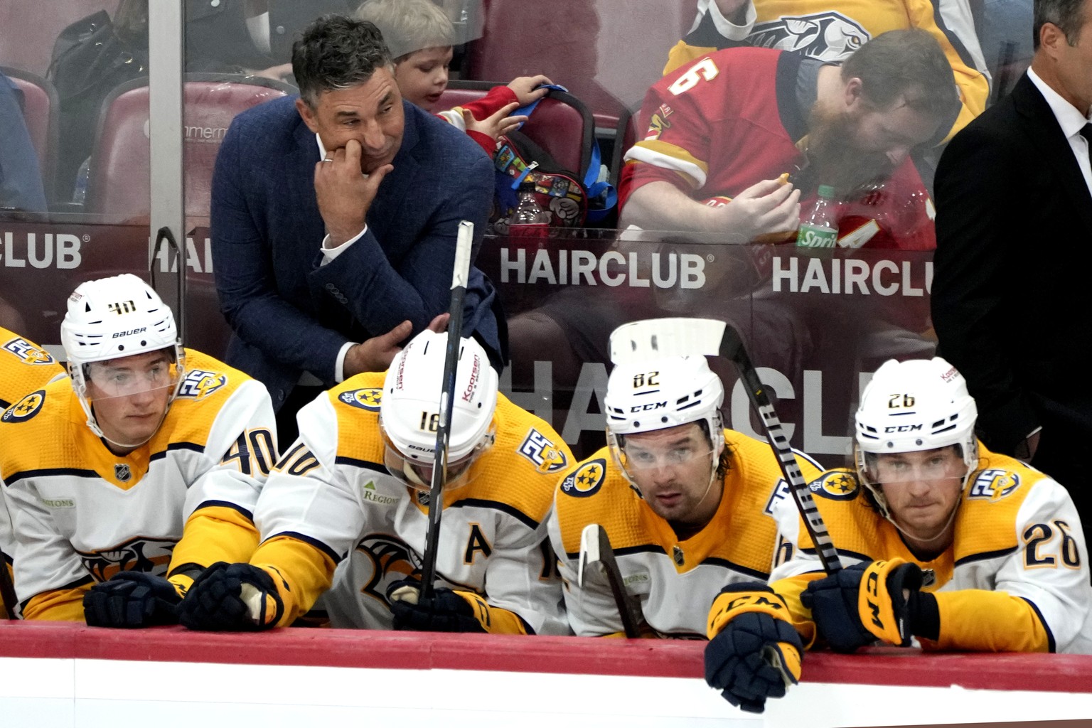 Nashville Predators head coach Andrew Brunette, top left, looks on during the third period of a preseason NHL hockey game against the Florida Panthers, Monday, Sept. 25, 2023, in Sunrise, Fla. (AP Pho ...