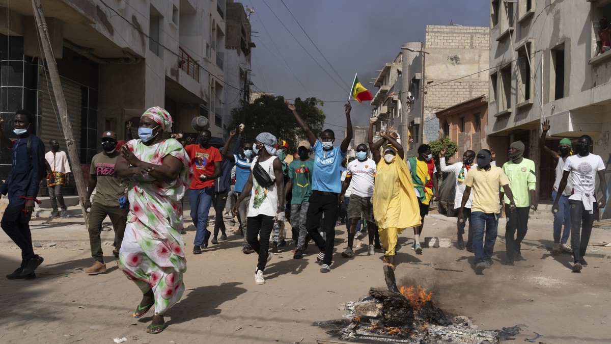 Demonstrators protest President Macky Sall decision to postpone the Feb. 25 vote, citing an electoral dispute between the parliament and the judiciary regarding some candidacies in Dakar, Senegal, Fri ...