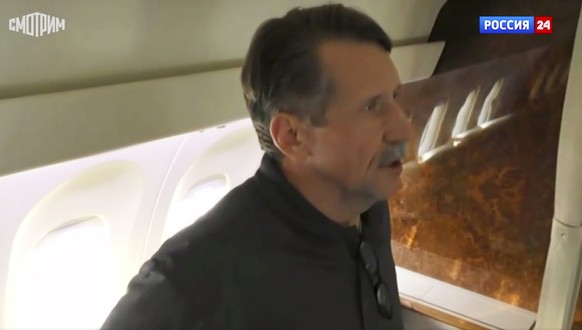In this image taken from video provided by RU-24 Russian Television on Friday, Dec. 9, 2022, Russian citizen Viktor Bout who was exchanged for U.S. basketball player Brittney Griner, speaks in a Russi ...