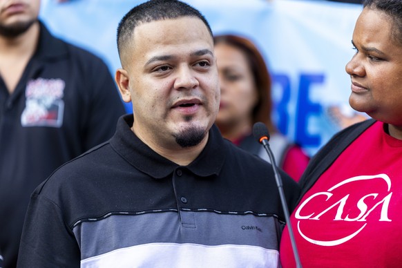 epa12321585 Kilmar Abrego Garcia (C) delivers remarks during a rally before his check in at the ICE Baltimore Field Office in Baltimore Maryland, USA, 25 August 2025. Garcia could be facing deportatio ...