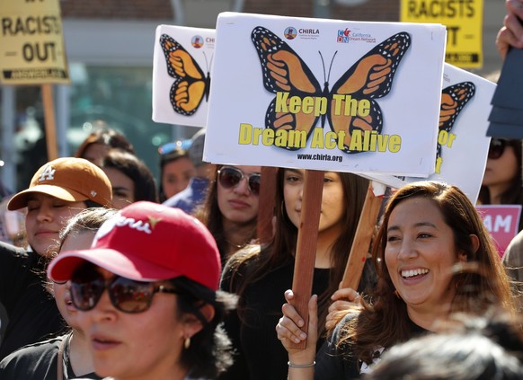 epa06494864 Dreamers join hundreds of demonstrators calling for DACA (Deferred Action for Childhood Arrivals) protection and protesting against US President Donald Trump in a national day of action in ...