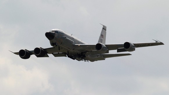 epa05147429 An US Air Force Boeing RC-135 reconnaissance aircraft lands back after a mission to US Kadena air base in Kadena, Okinawa prefecture, southern Japan, 07 February 2016. Earlier in the day,  ...